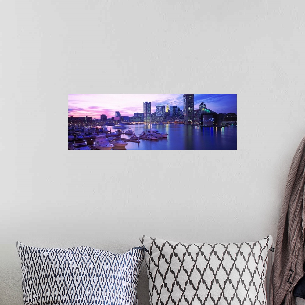 A bohemian room featuring Panoramic photograph displays a number of boats sitting docked within a waterfront in the Northea...
