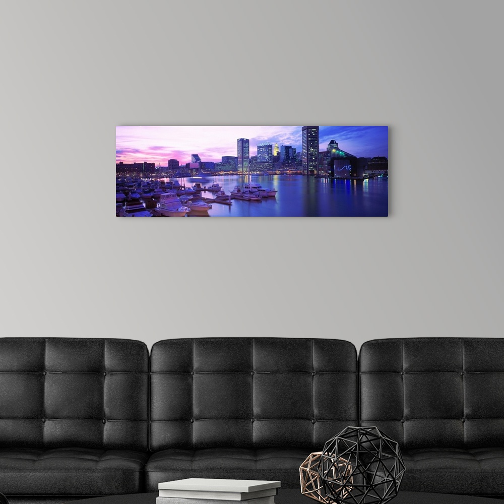 A modern room featuring Panoramic photograph displays a number of boats sitting docked within a waterfront in the Northea...