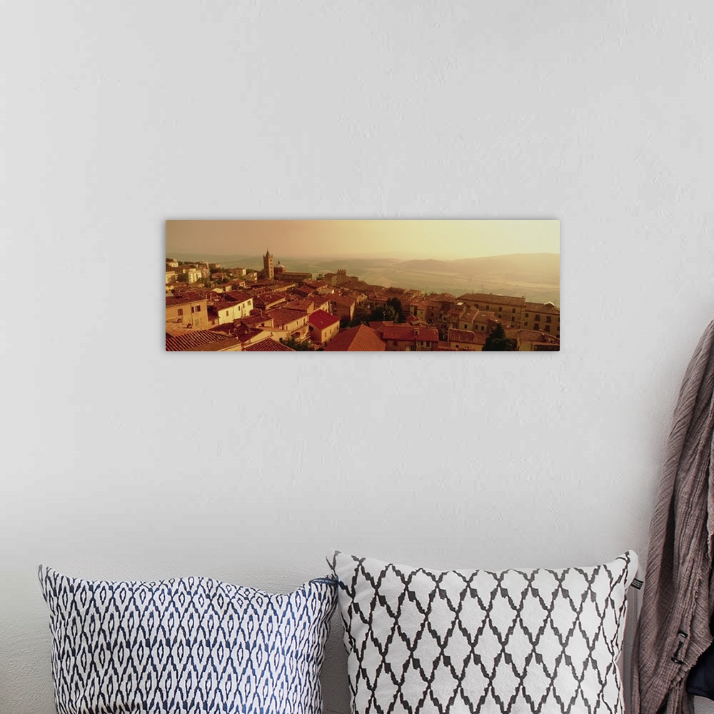A bohemian room featuring Decorative artwork perfect for the home that is a panoramic photograph taken of a town in Italy a...