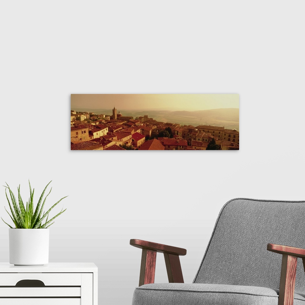 A modern room featuring Decorative artwork perfect for the home that is a panoramic photograph taken of a town in Italy a...