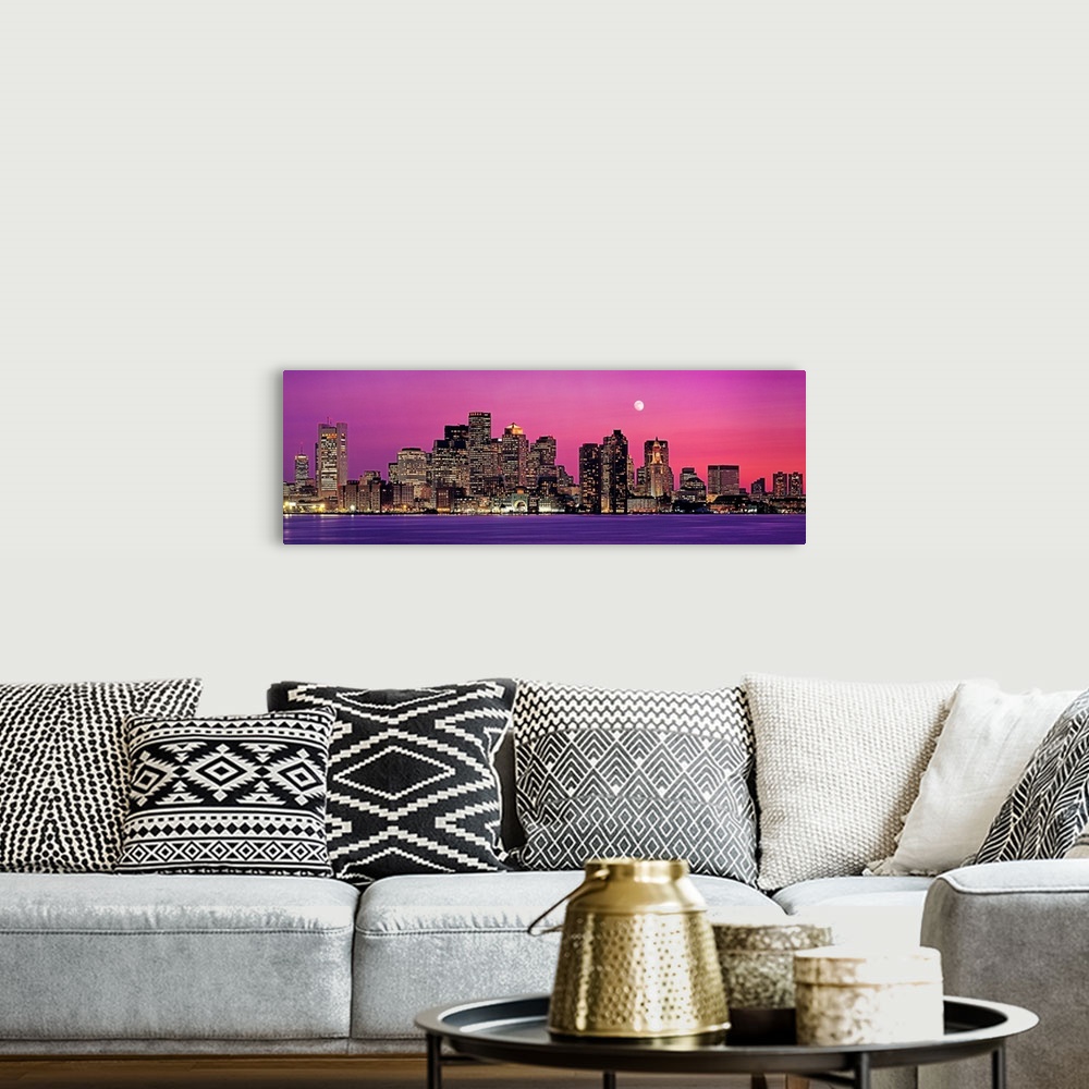 A bohemian room featuring Panoramic photograph of a skyline in Boston, Massachusetts at night by the shore.  The moon in th...