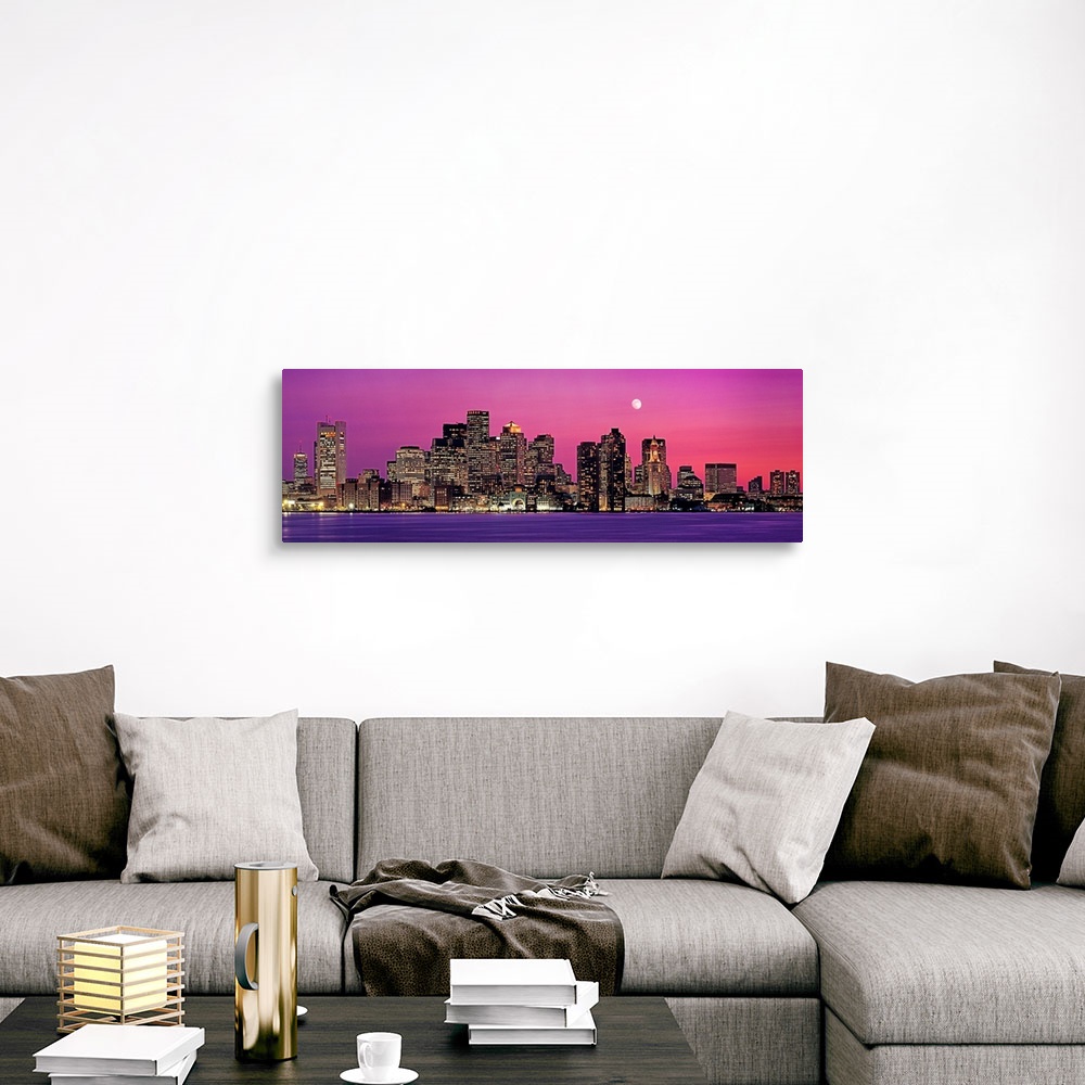 A traditional room featuring Panoramic photograph of a skyline in Boston, Massachusetts at night by the shore.  The moon in th...