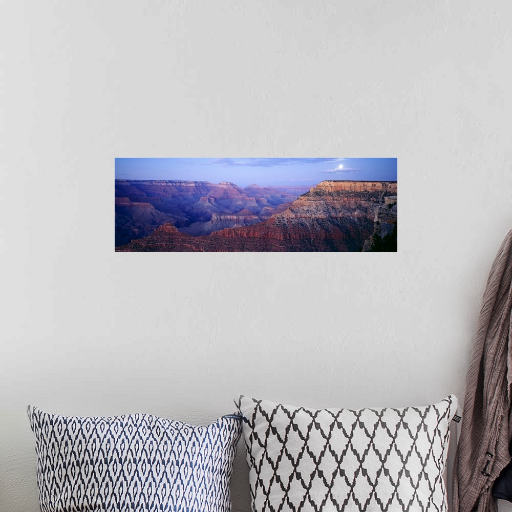 A bohemian room featuring Big panoramic photo from Mather Point in the Grand Canyon in Arizona (AZ) at dusk on a night with...