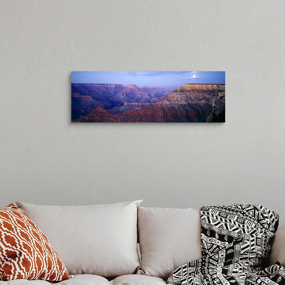 A bohemian room featuring Big panoramic photo from Mather Point in the Grand Canyon in Arizona (AZ) at dusk on a night with...