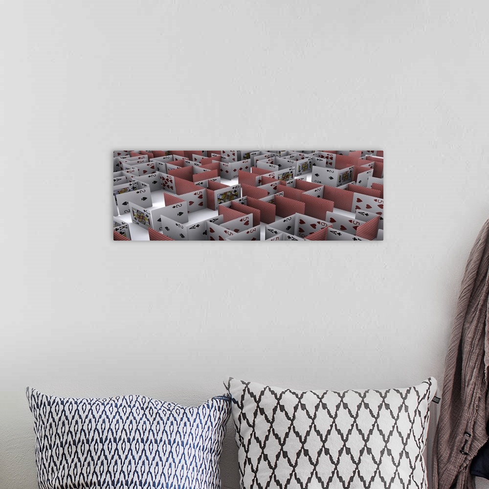 A bohemian room featuring Wall docor of an image on canvas of a maze of cards.