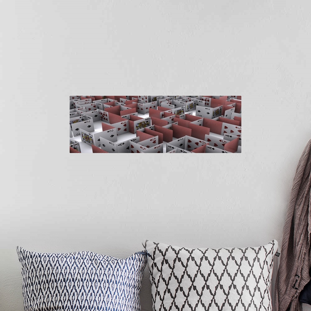 A bohemian room featuring Wall docor of an image on canvas of a maze of cards.