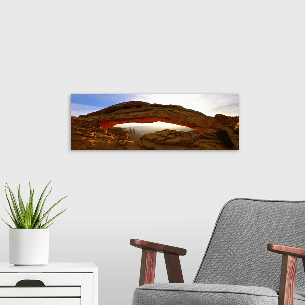 A modern room featuring Mesa Arch glowing at sunrise, Canyonlands National Park, Utah