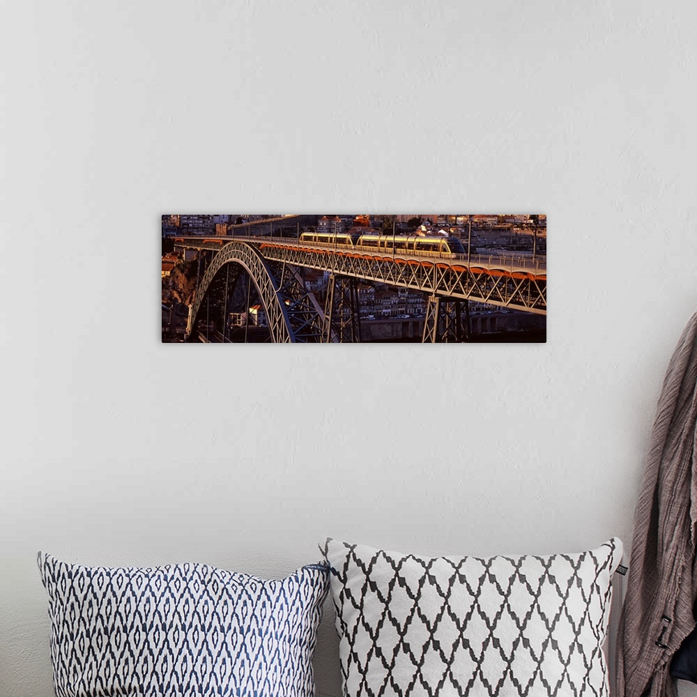 A bohemian room featuring Metro train on a bridge, Dom Luis I Bridge, Duoro River, Porto, Portugal