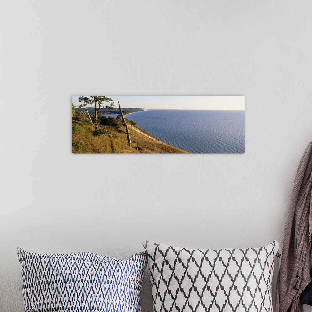 A bohemian room featuring Panoramic photograph taken of a national park in Michigan with a vast view of Lake Michigan to th...