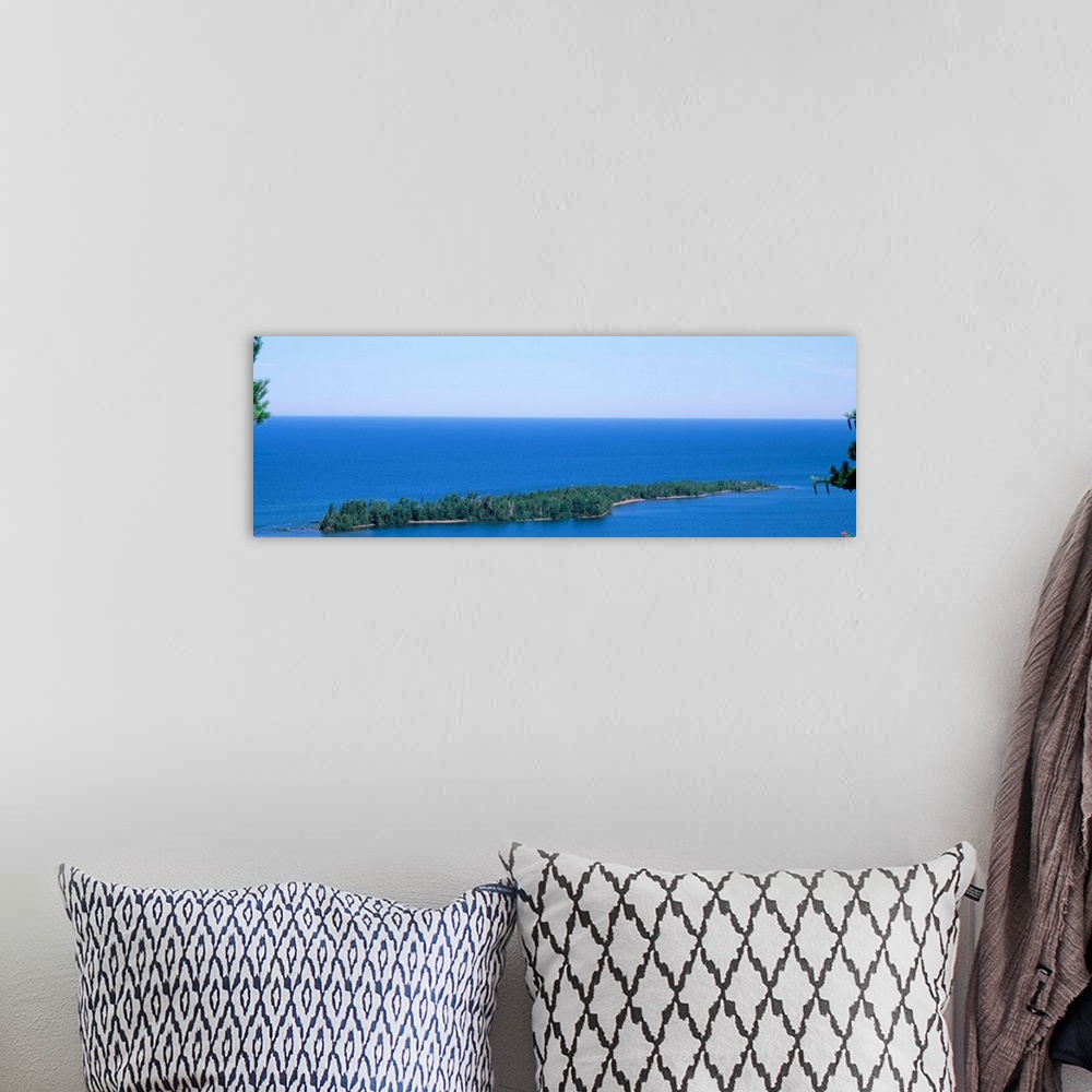 A bohemian room featuring Michigan, Upper Peninsula, Porters Island, Aerial view of the Lake Superior