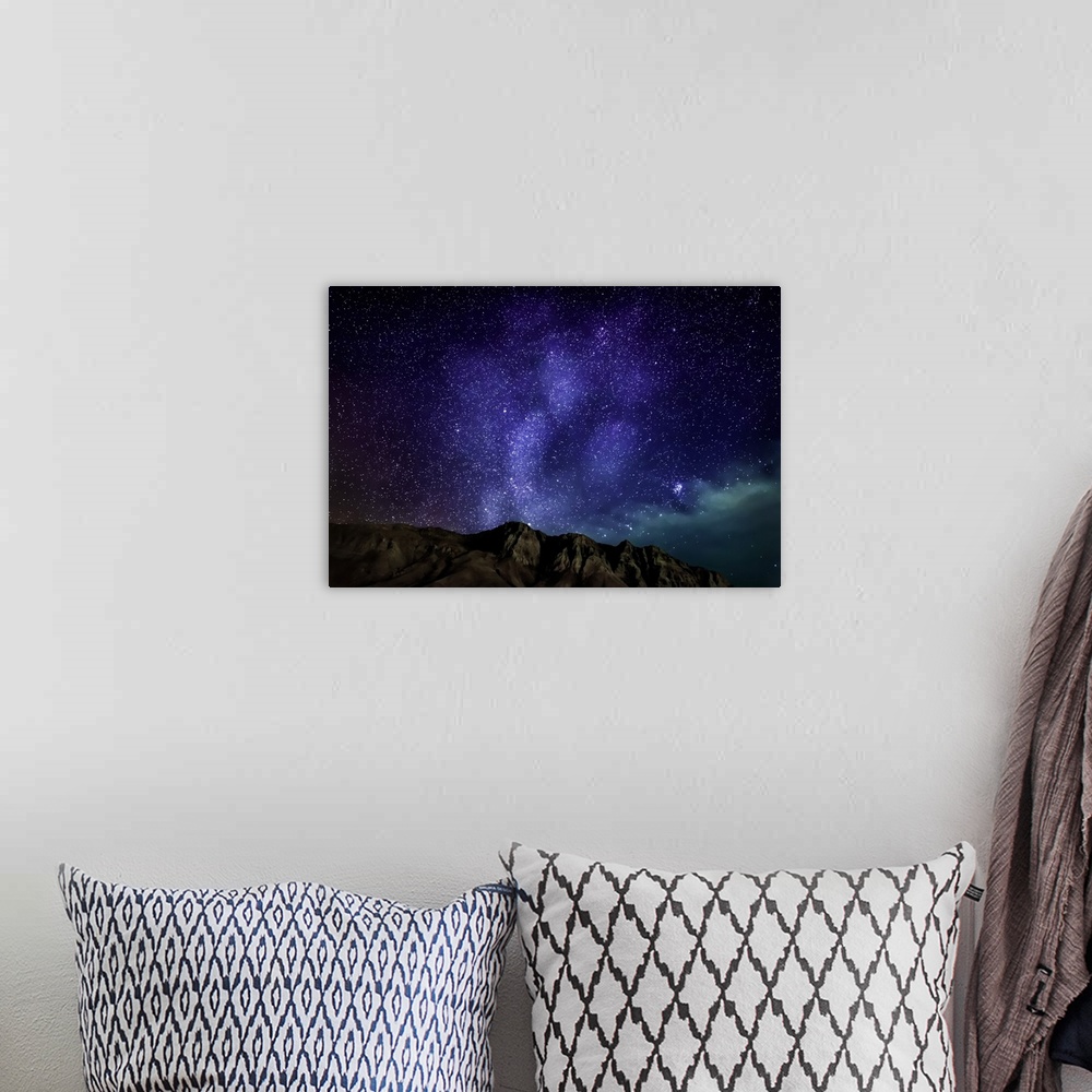 A bohemian room featuring Milky Way Galaxy with Aurora Borealis or Northern lights, Kjalarnes, Reykjavik, Iceland