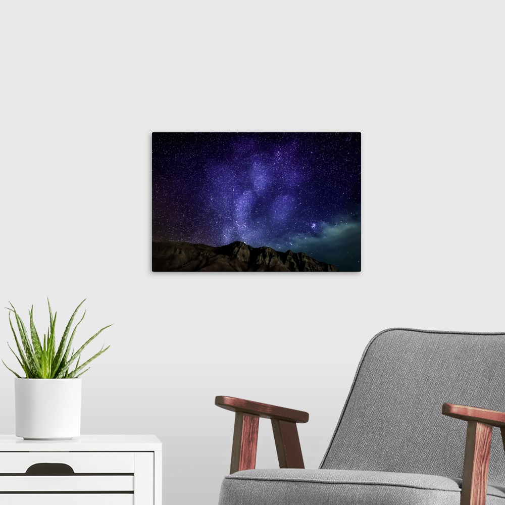 A modern room featuring Milky Way Galaxy with Aurora Borealis or Northern lights, Kjalarnes, Reykjavik, Iceland