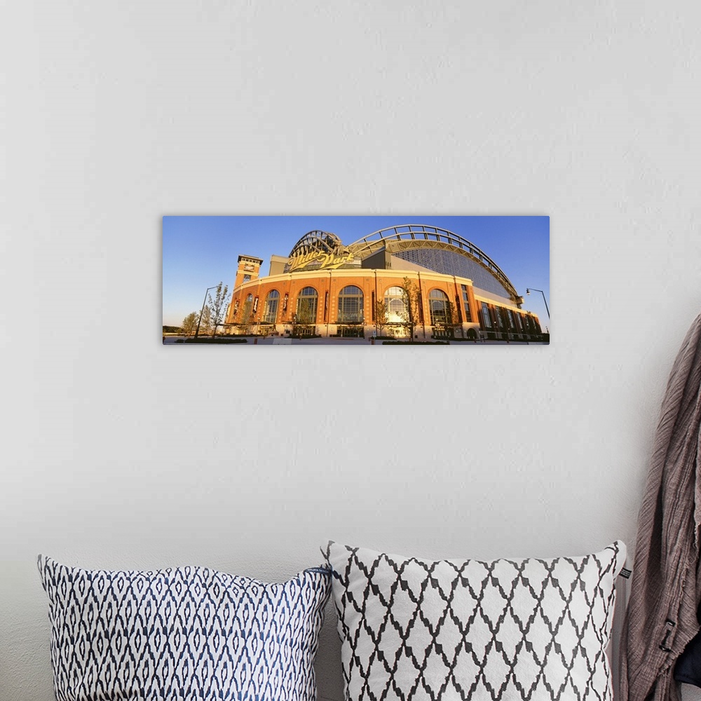 A bohemian room featuring Giant, wide angle photograph of Miller Park in Milwaukee, Wisconsin.
