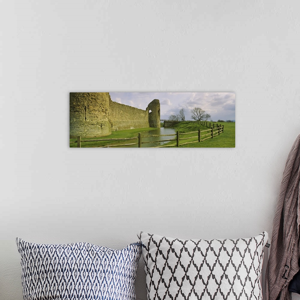 A bohemian room featuring Moat surrounding a castle, Pevensey Castle, Pevensey, Sussex, England