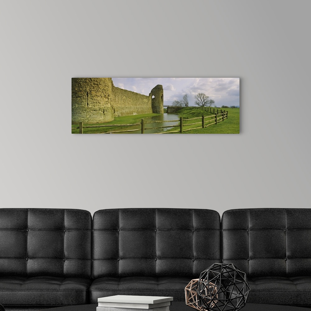 A modern room featuring Moat surrounding a castle, Pevensey Castle, Pevensey, Sussex, England