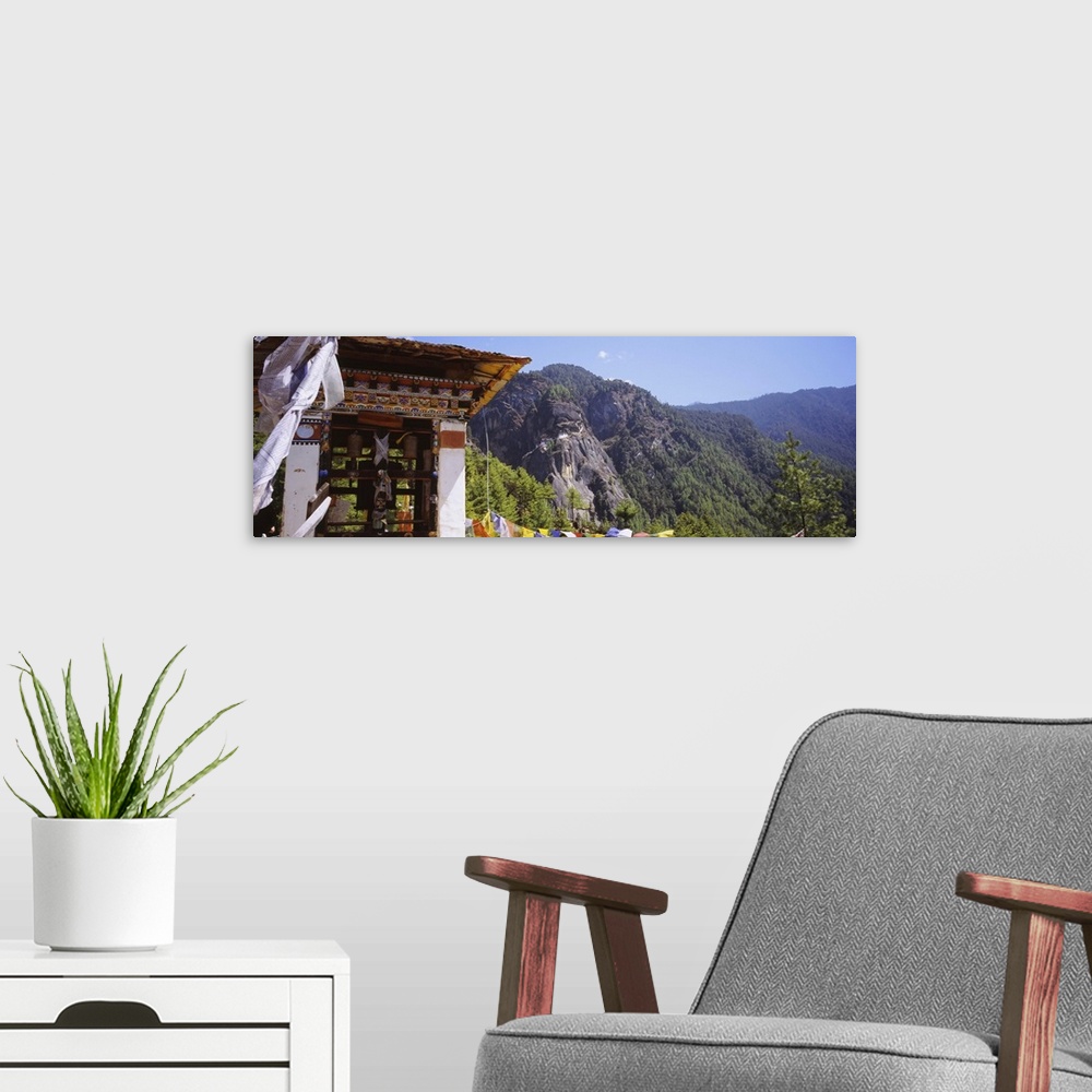 A modern room featuring Monastery on a mountain with Taktshang in the background, Paro Valley, Bhutan