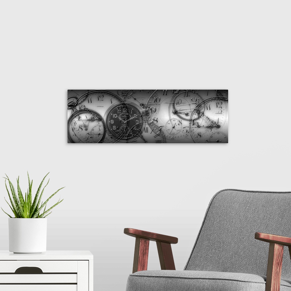 A modern room featuring Panoramic monochromatic canvas art shows a collage of antique handheld time pieces layered on top...