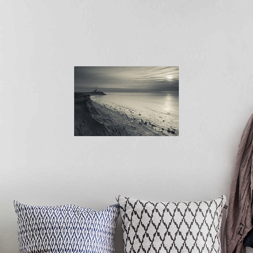 A bohemian room featuring This is a landscape photograph of the shoreline on a partially cloud day.