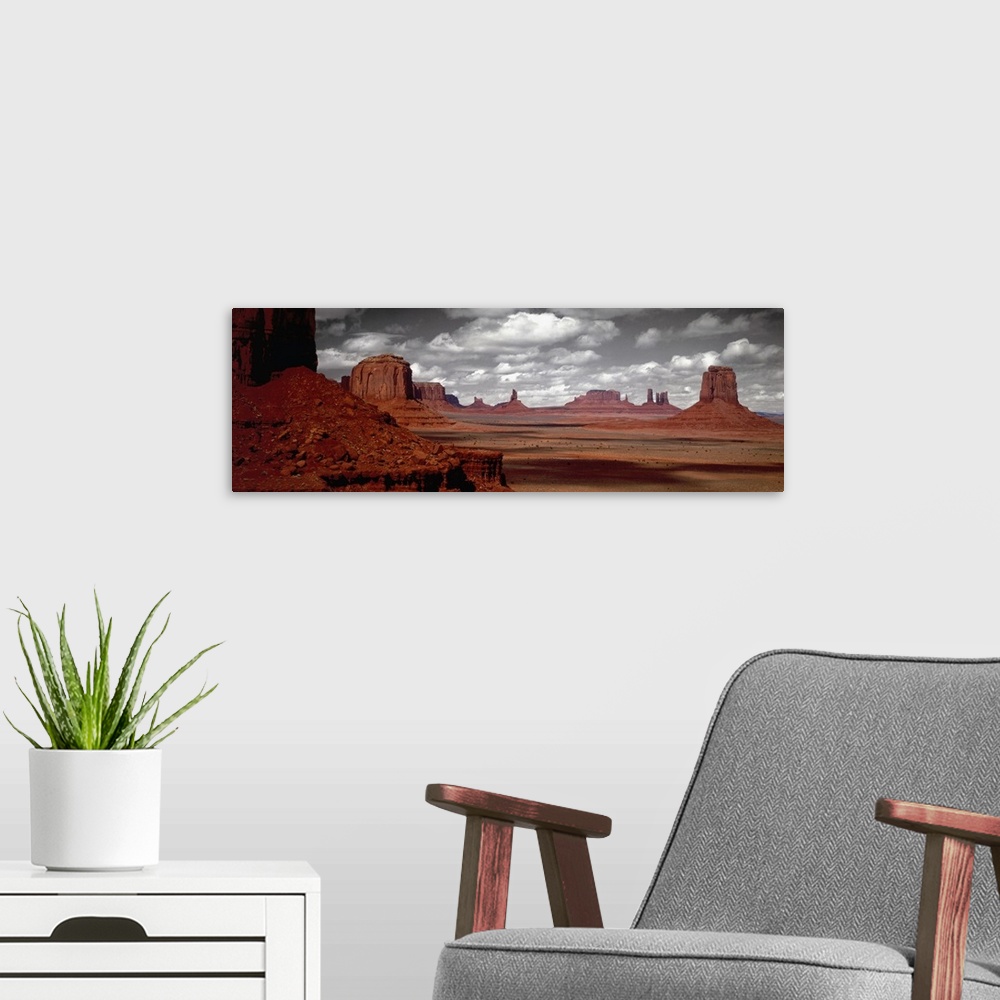 A modern room featuring Selective color photograph of the Arizona desert landscape. The rocky landscape remains in color ...