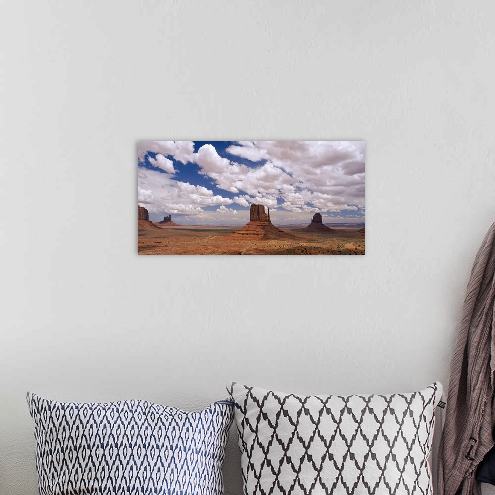 A bohemian room featuring Horizontal photo on canvas of rock monuments in a desert in Arizona.