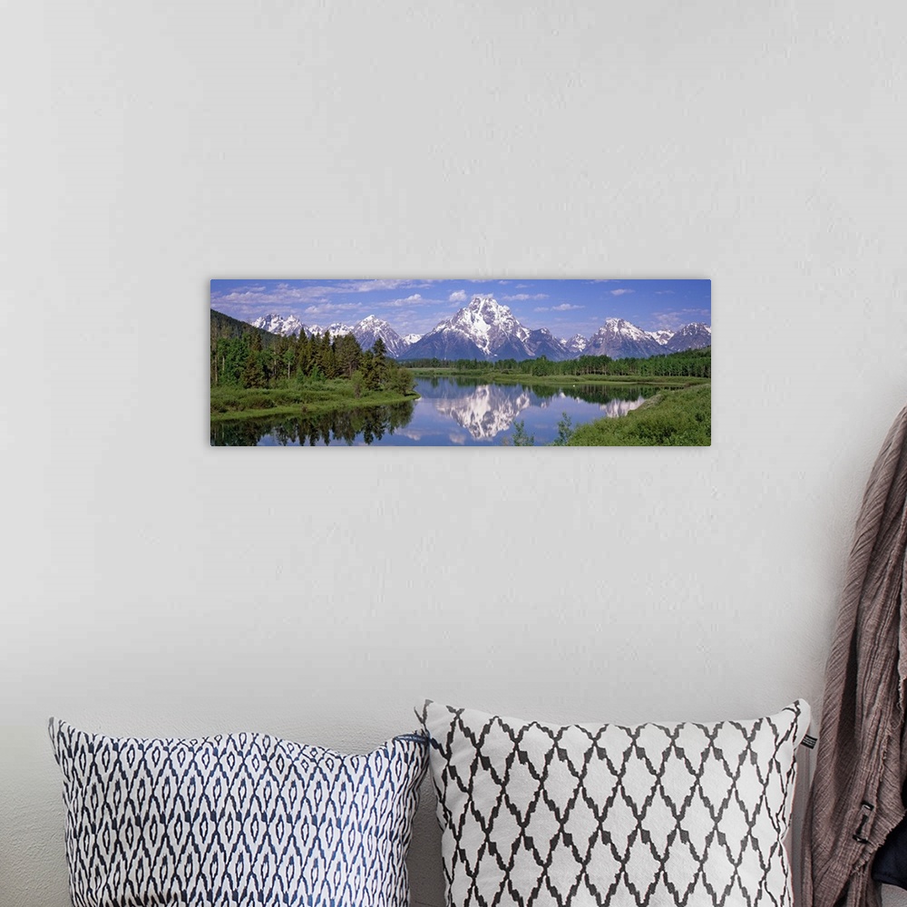 A bohemian room featuring Scenic panoramic photo of the Mount Moran Snake River in the Oxbow Bend in the Grand Teton Nation...