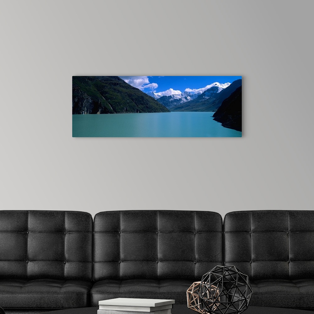 A modern room featuring Mountain at the lakeside, Grande Dixence Dam, Valais Canton, Switzerland
