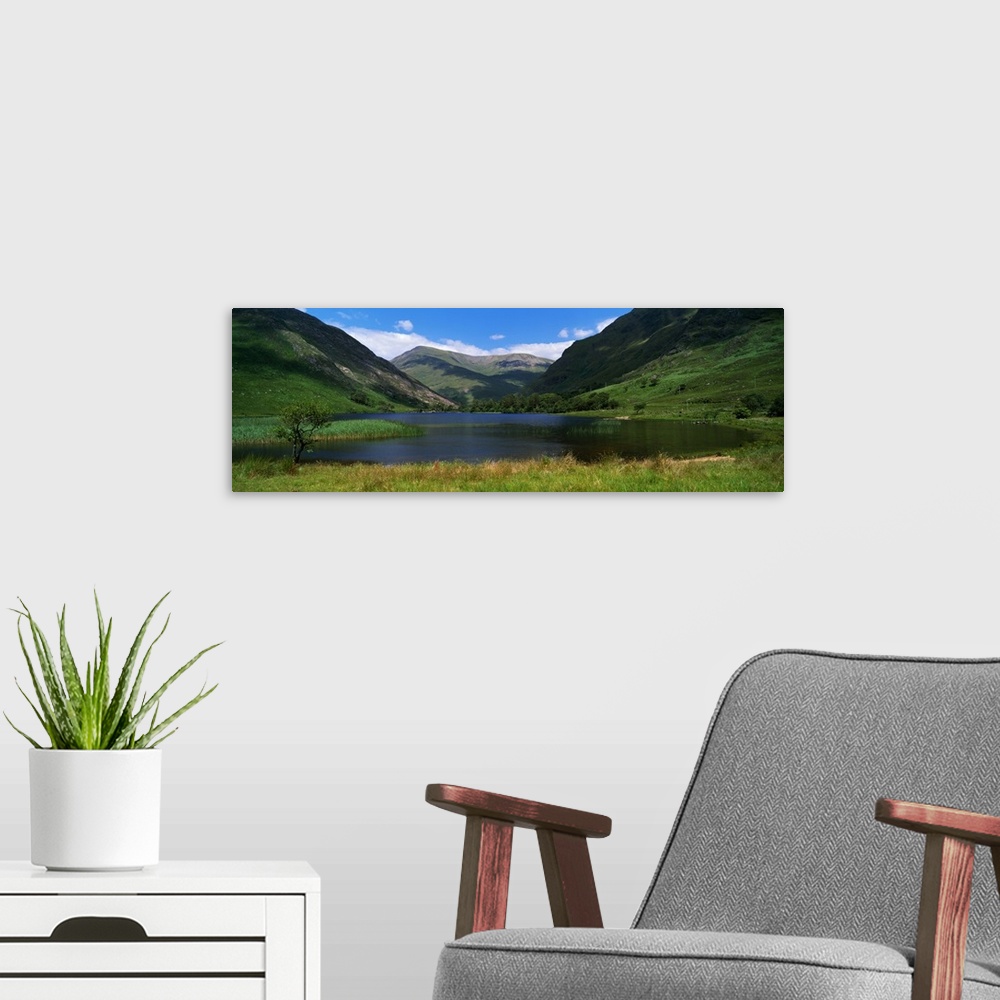 A modern room featuring Mountain landscape with lake, Ireland