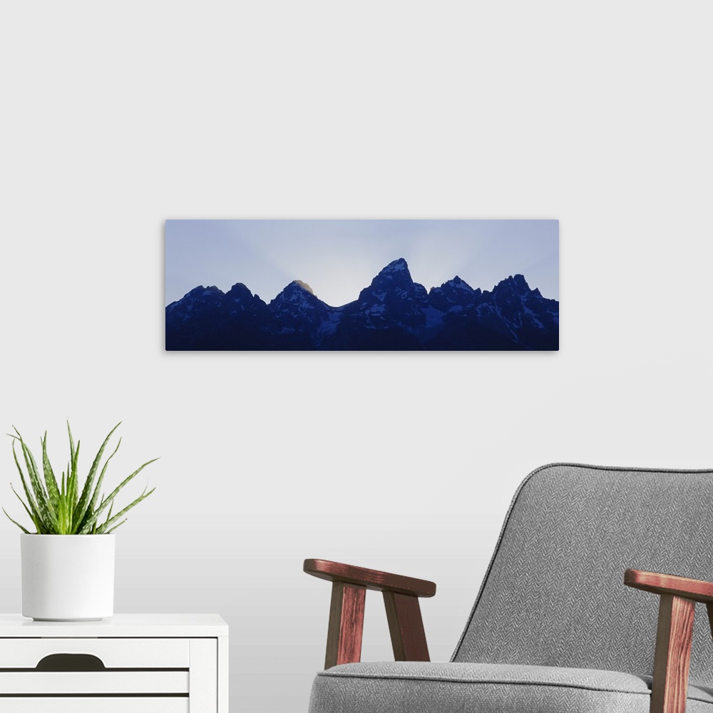 A modern room featuring Mountain peaks at dusk, Grand Teton National Park, Wyoming