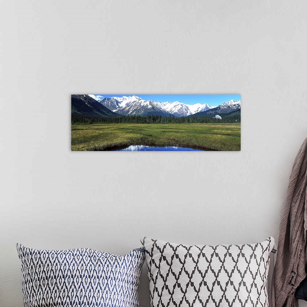 A bohemian room featuring Mountain scene with lake, distant hotel, Moose Meadow, Alaska