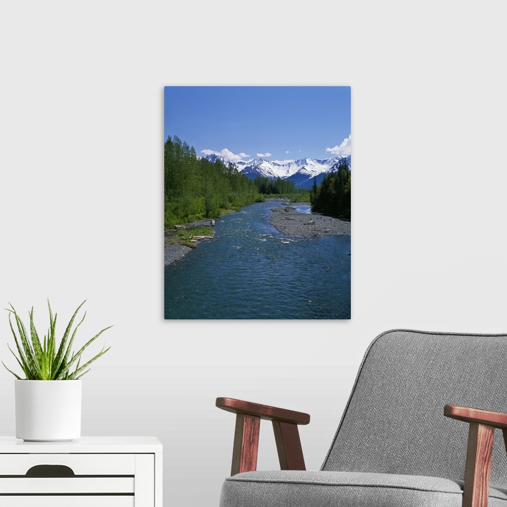 A modern room featuring Mountain stream, snowy Chugach Mountains, summer, Alaska