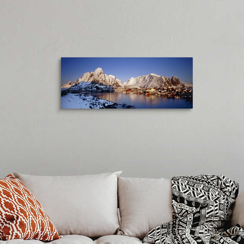 A bohemian room featuring Mountains along a sea side, Reine, Lofoten, Nordland County, Norway