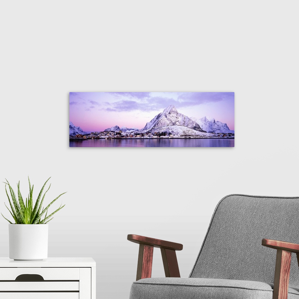 A modern room featuring Mountains along a sea side, Reine, Lofoten, Nordland County, Norway