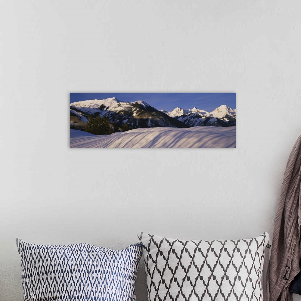 A bohemian room featuring Mountains covered with snow, Snowmass Mountain on left, Capitol Peak on right, Elk Mountains, Sno...