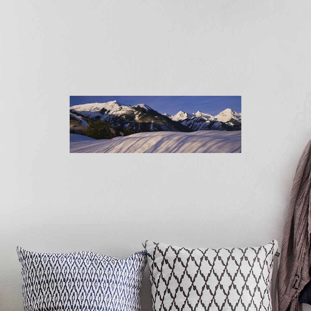 A bohemian room featuring Mountains covered with snow, Snowmass Mountain on left, Capitol Peak on right, Elk Mountains, Sno...