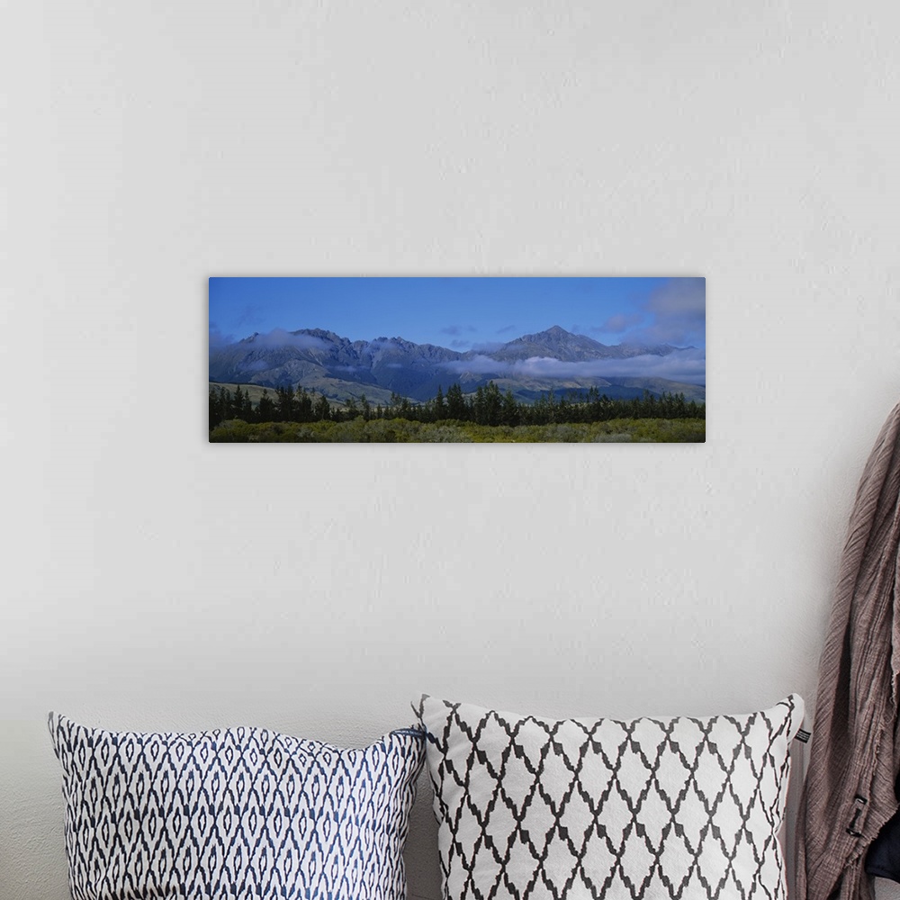 A bohemian room featuring Mountains on a landscape, Takitimu Range, Southland, South Island, New Zealand