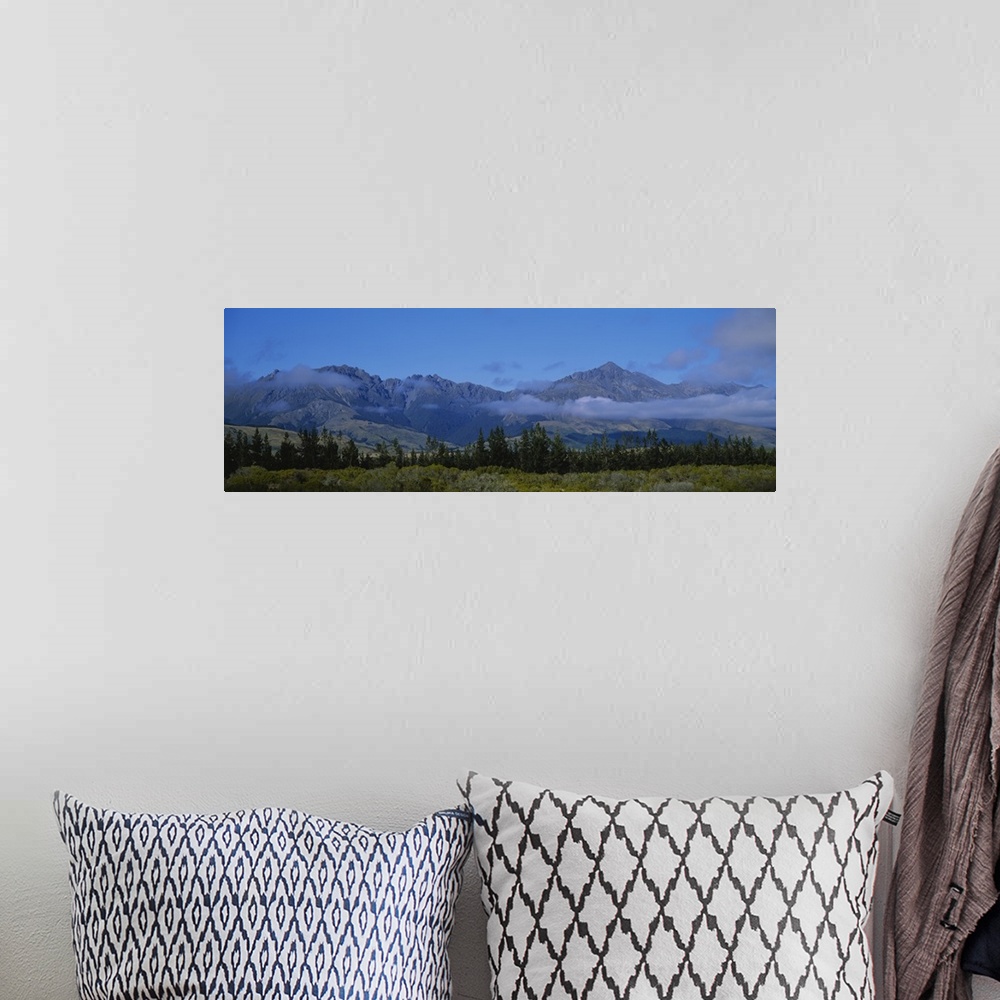 A bohemian room featuring Mountains on a landscape, Takitimu Range, Southland, South Island, New Zealand