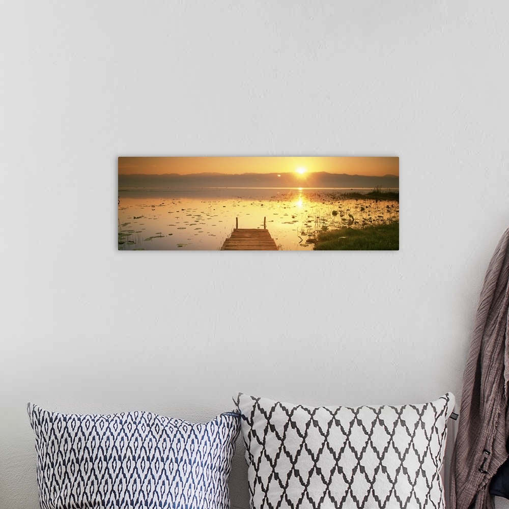 A bohemian room featuring Myanmar, Inle Lake, View of the sunset and pier