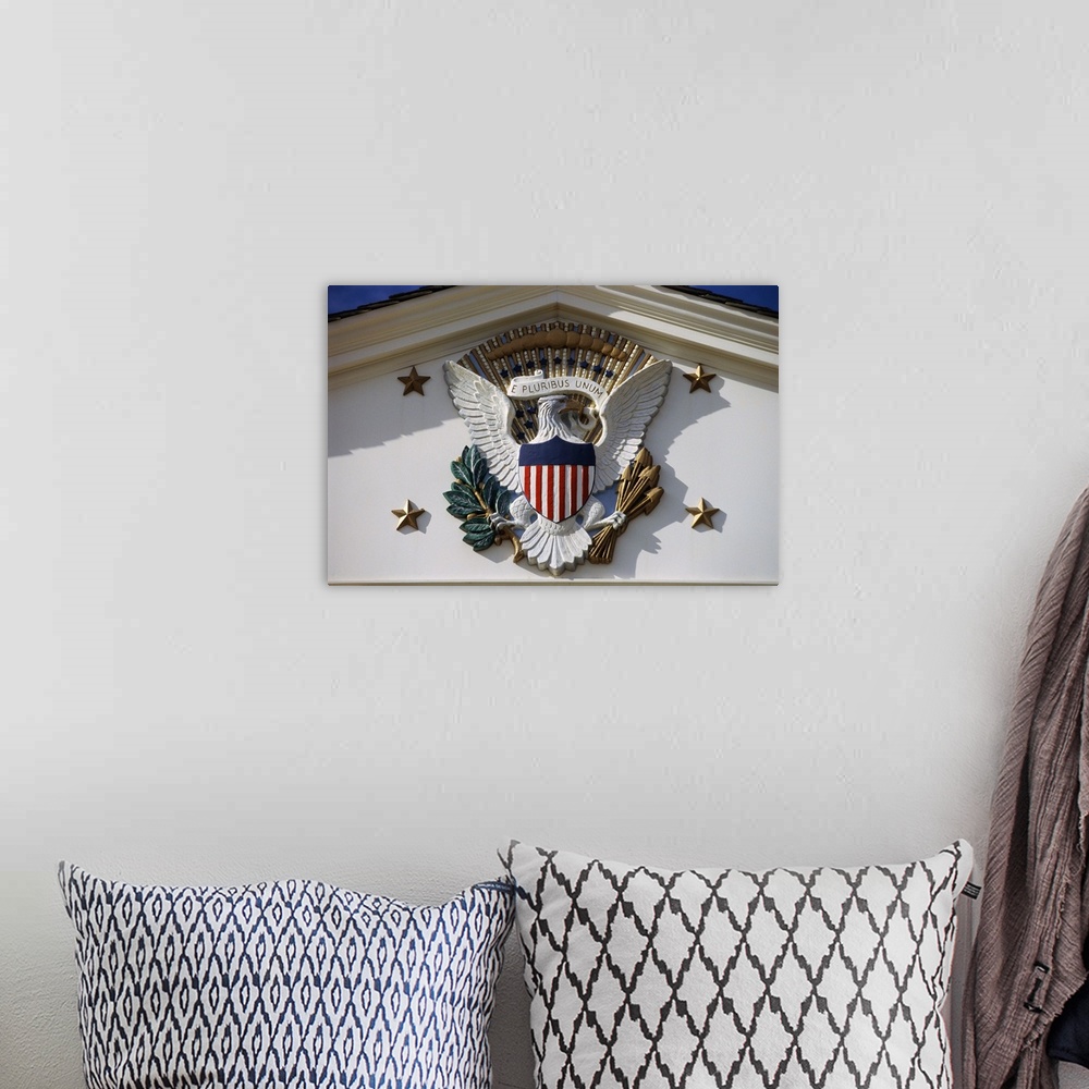A bohemian room featuring National Emblem of United States