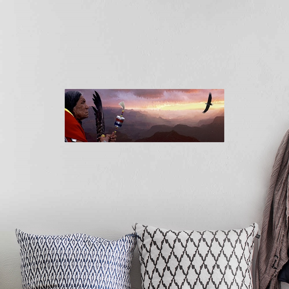 A bohemian room featuring Giant panoramic artwork featuring a Native American figure and flying bird with a vast mountain r...