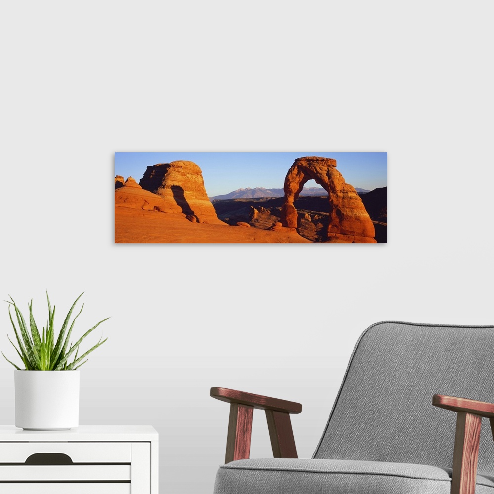 A modern room featuring Natural arch in a desert, Delicate Arch, Arches National Park, Utah