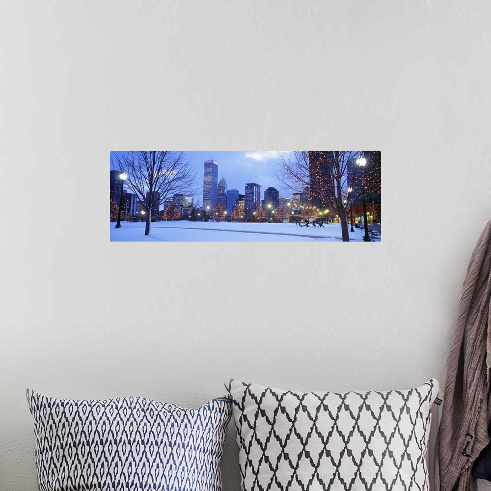 A bohemian room featuring Panoramic photograph of the Navy Pier Park at dusk lit up for the holidays in Chicago, Illinois.