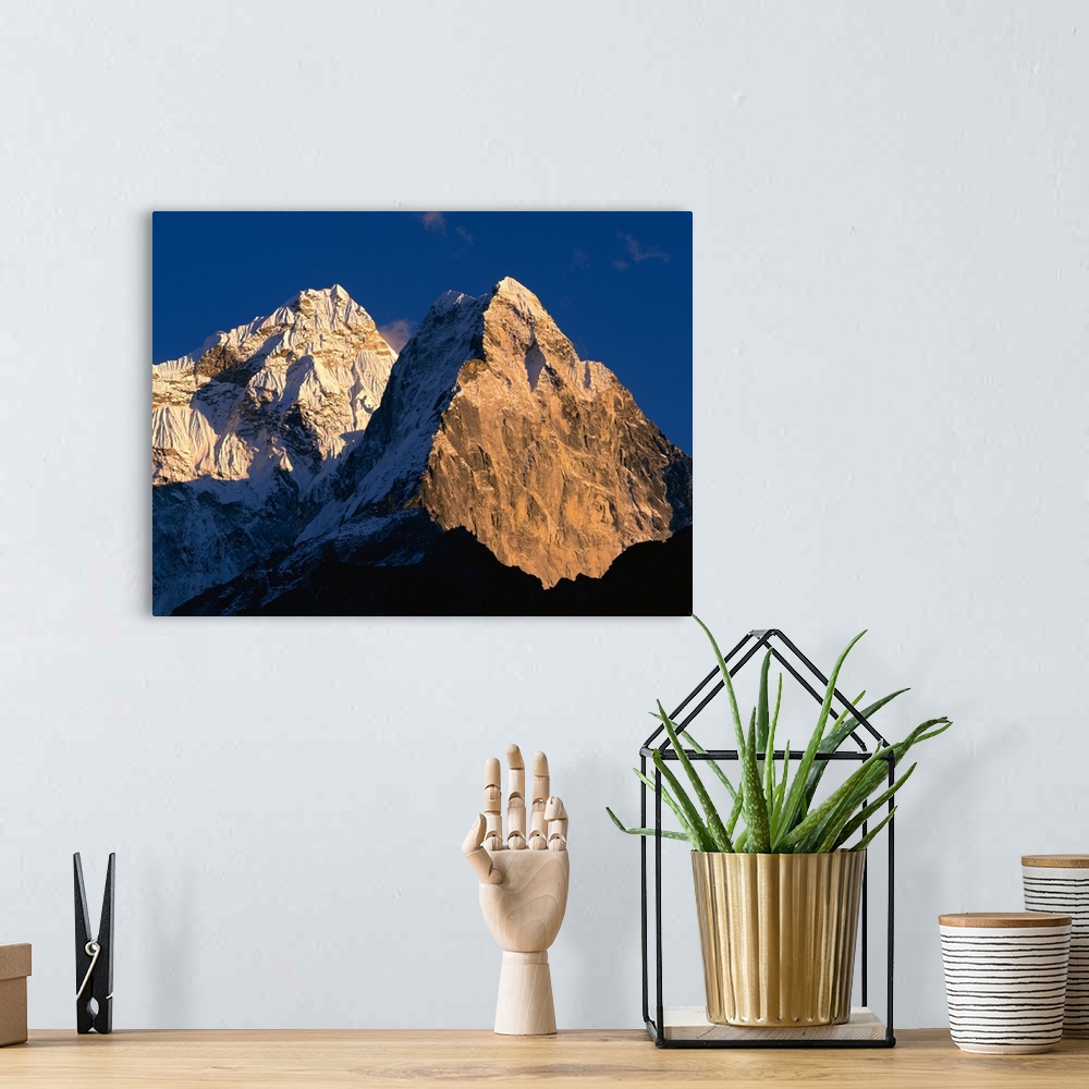 A bohemian room featuring Nepal, Ama Dablam, Sunlight over the mountain peak