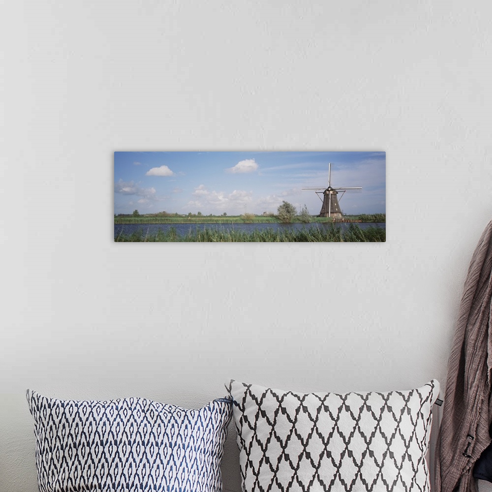 A bohemian room featuring Netherlands, Traditional windmill in the village