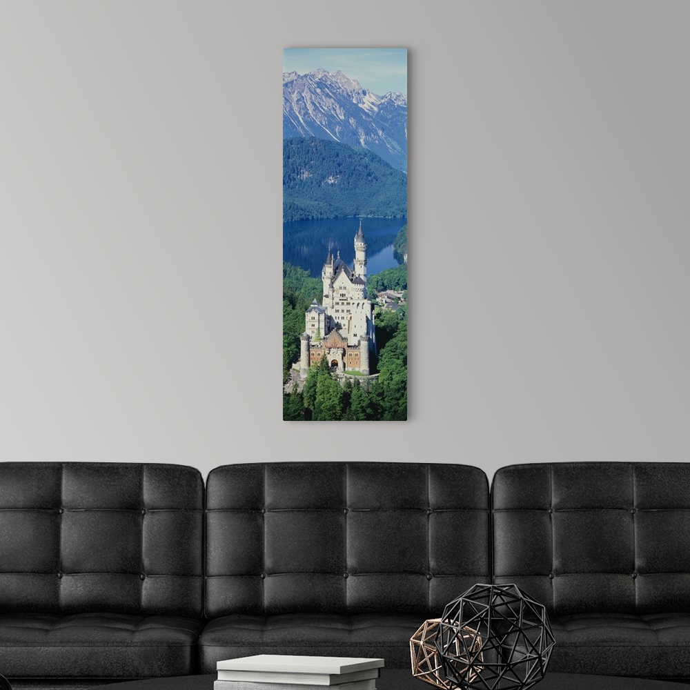 A modern room featuring Vertical panoramic photograph of choteau with lake and snow covered mountains in the distance.