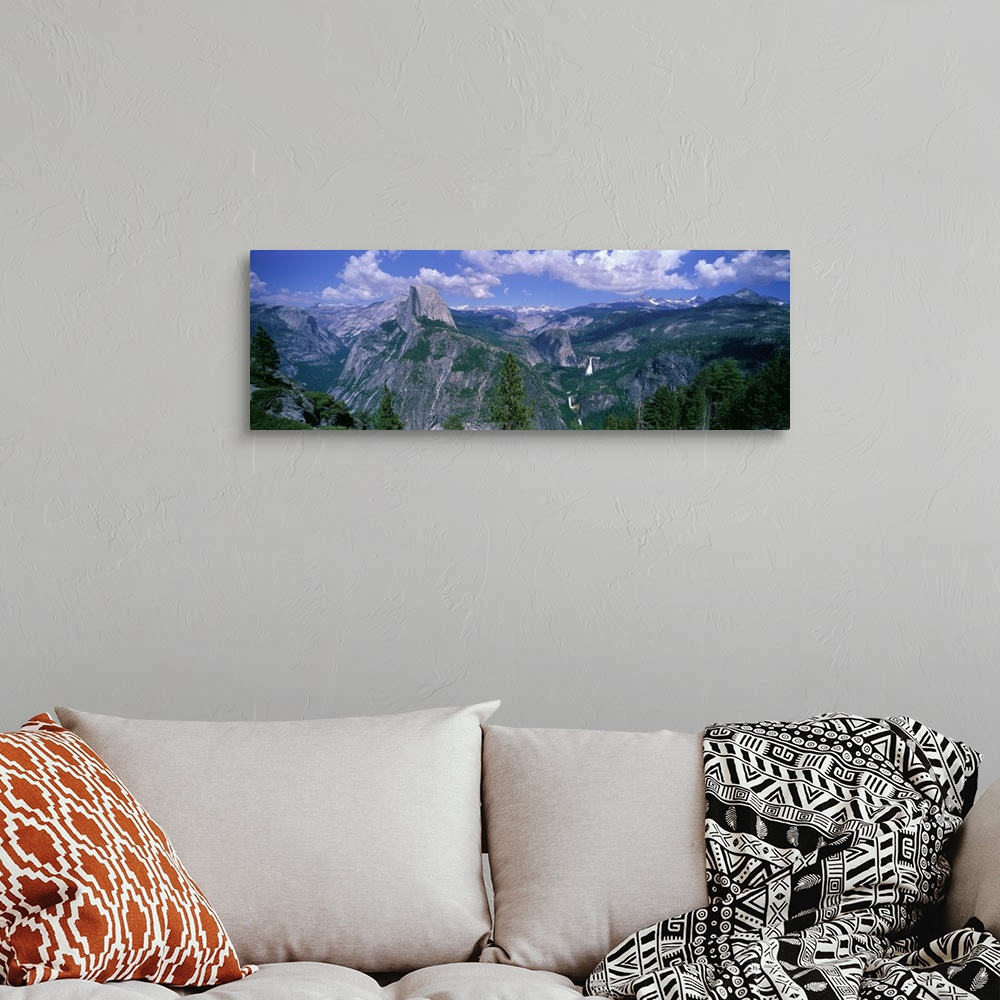 A bohemian room featuring Panoramic photograph taken from an aerial view overlooking a giant mountain range scattered with ...