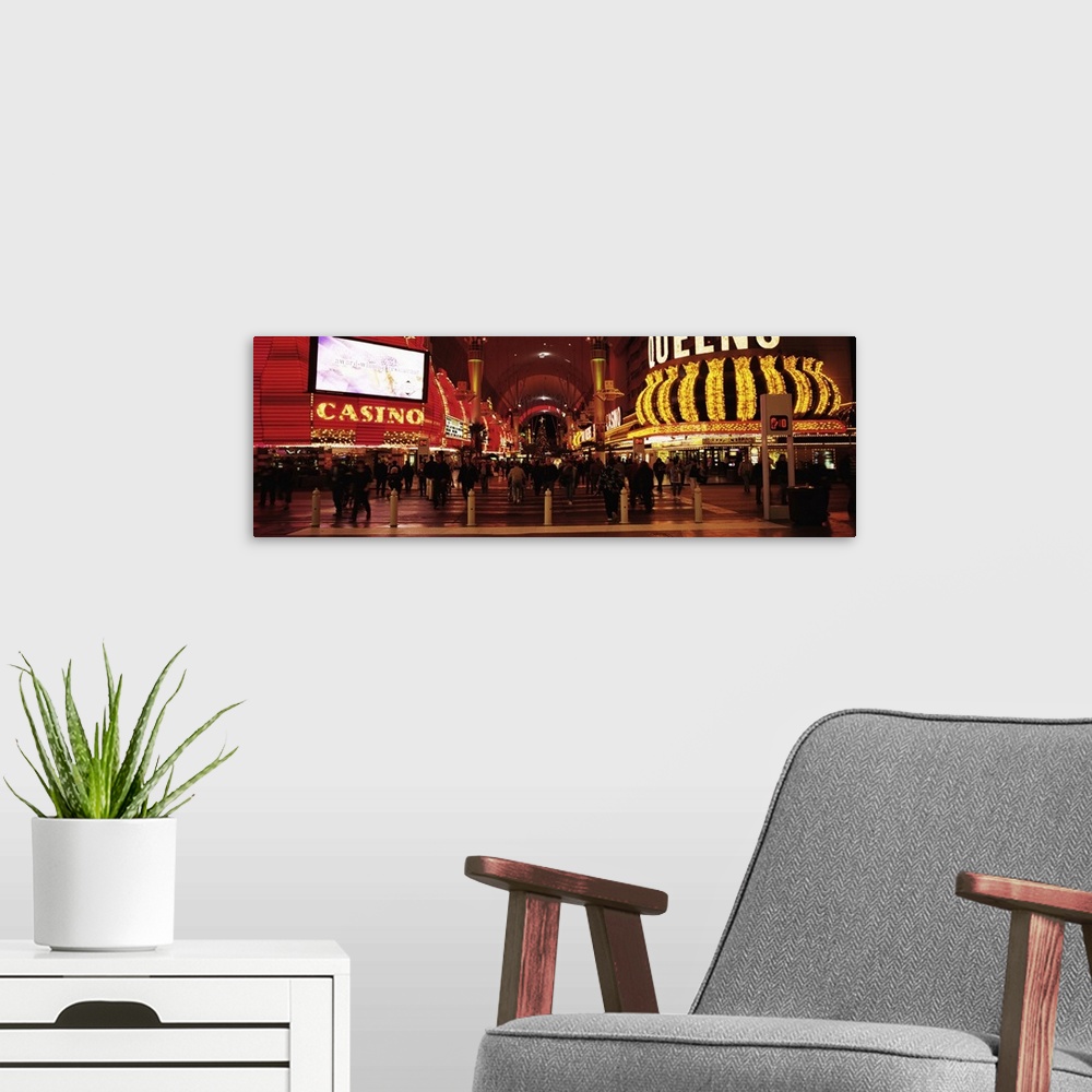 A modern room featuring Nevada, Las Vegas, The Fremont Street, Large group of people at a market street
