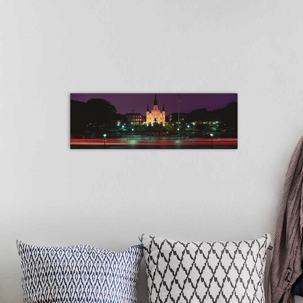 A bohemian room featuring This is a time lapsed photograph of a historic building on a panoramic canvas.