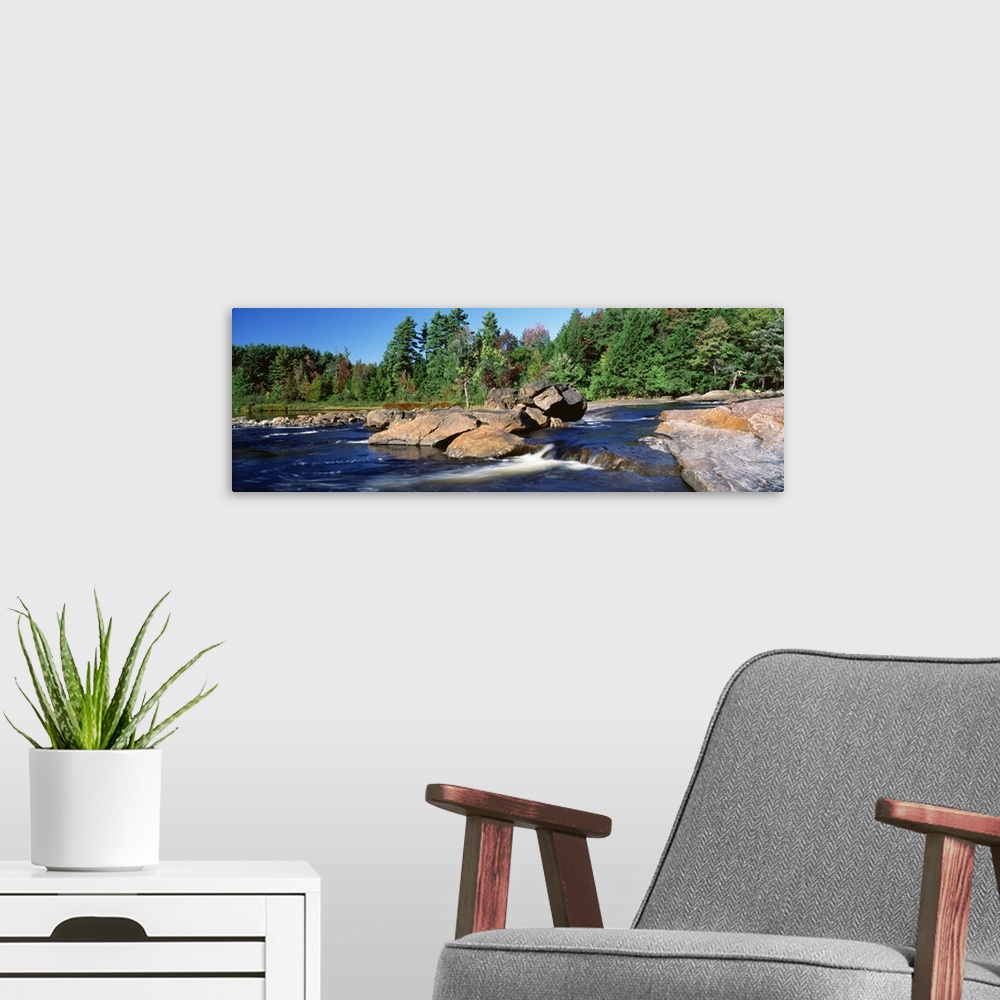 A modern room featuring New York, Adirondack State Park, Moose River, River flowing through the forest