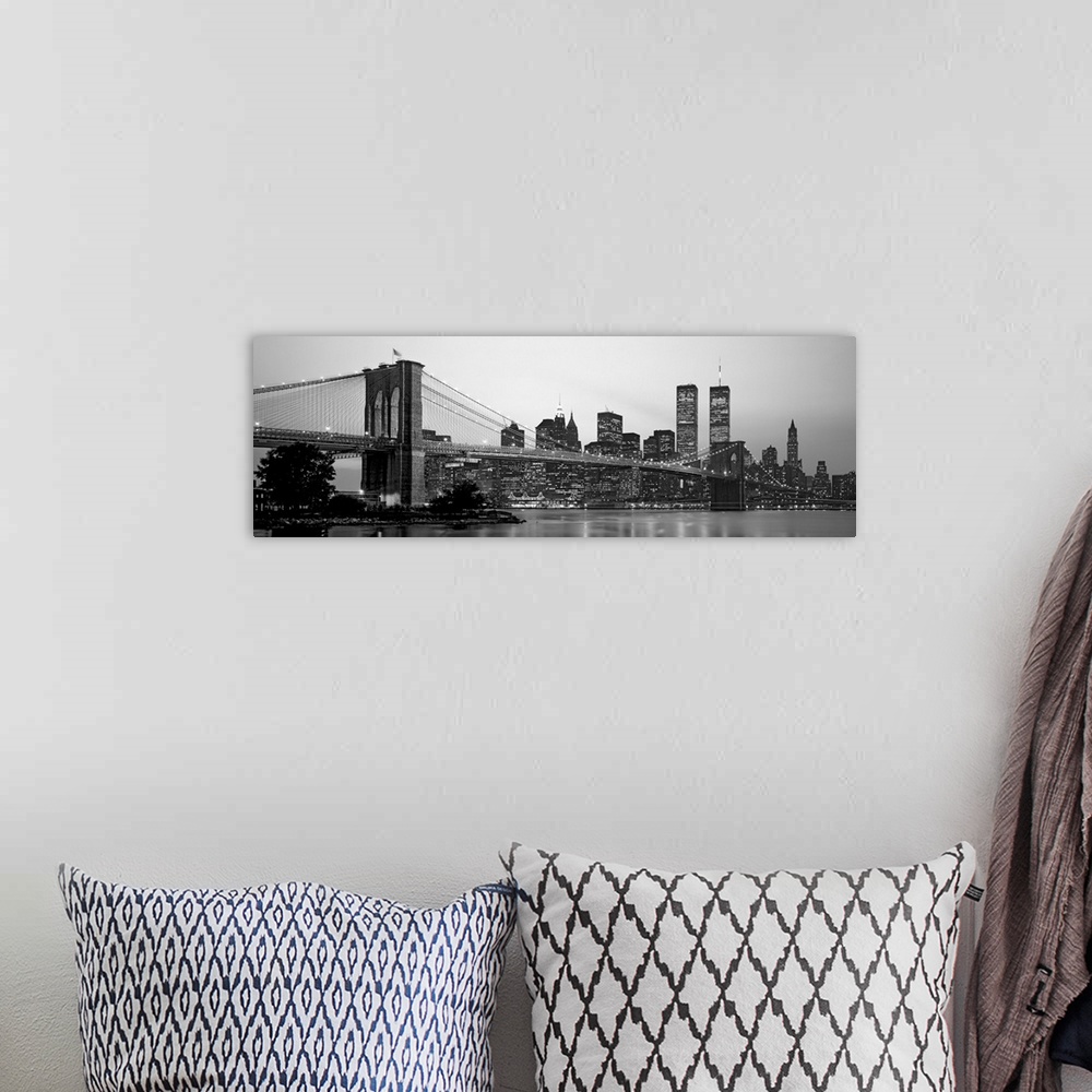 A bohemian room featuring Panoramic photograph of the Brooklyn Bridge against a skyline filled with skyscrapers in New York...