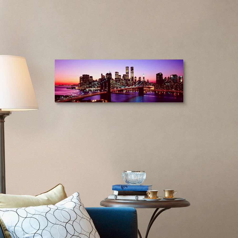 A traditional room featuring Large artwork for a living room of office of the Brooklyn Bridge and Manhattan with lights shinin...